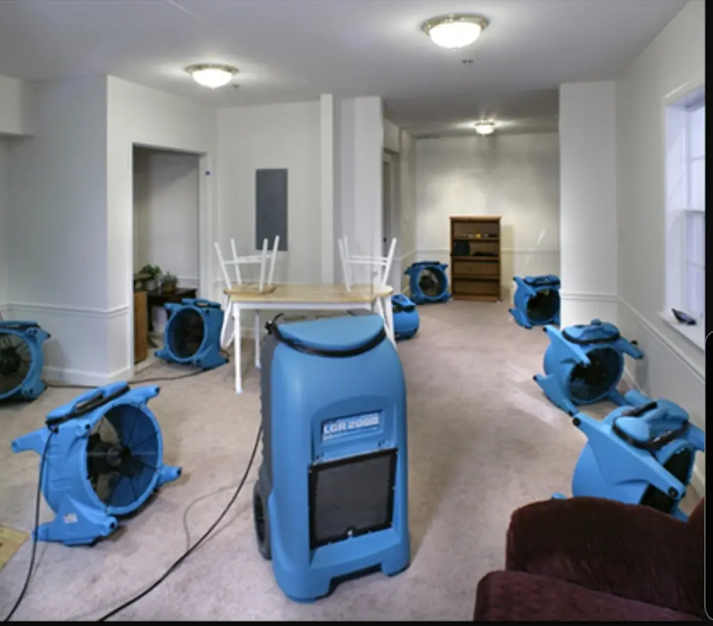 Air movers and dehumidifier setup for Water Extraction & Removal in Strasburg